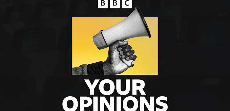 Man holding a megaphone with yellow background