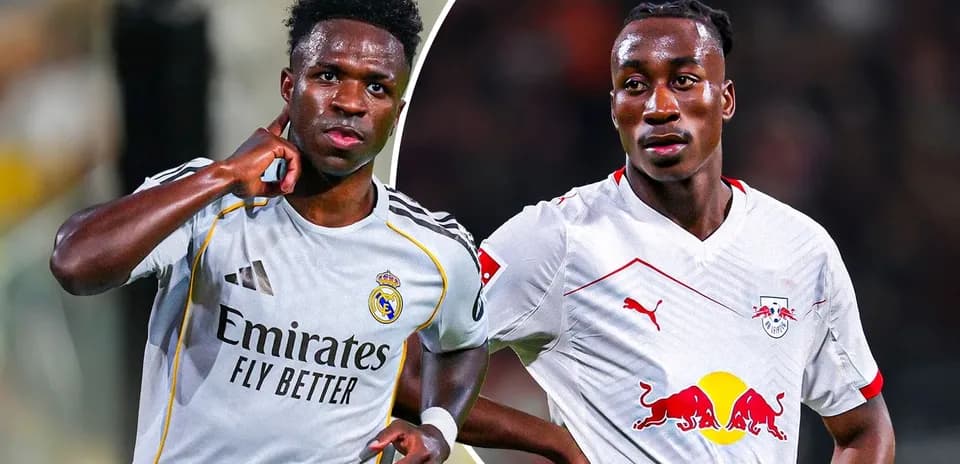 Vinícius Júnior y un jugador de RB Leipzig en acción