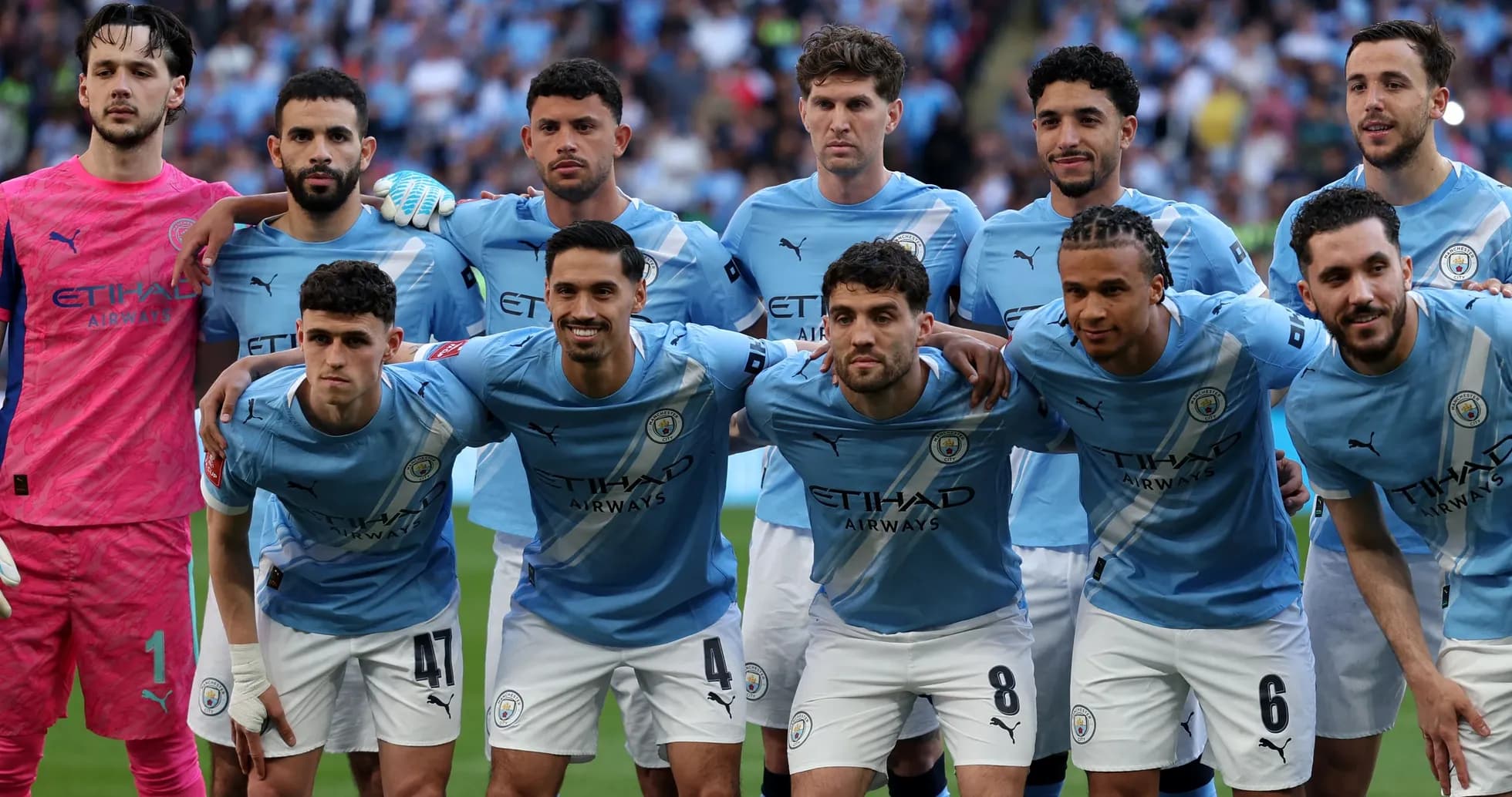 Jugadores de Manchester City posando en equipo