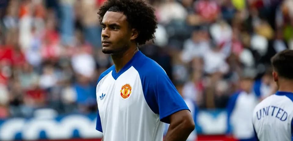 Jugador de Manchester United en calentamiento previo al partido