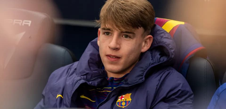 Jugador de FC Barcelona sentado en el banquillo