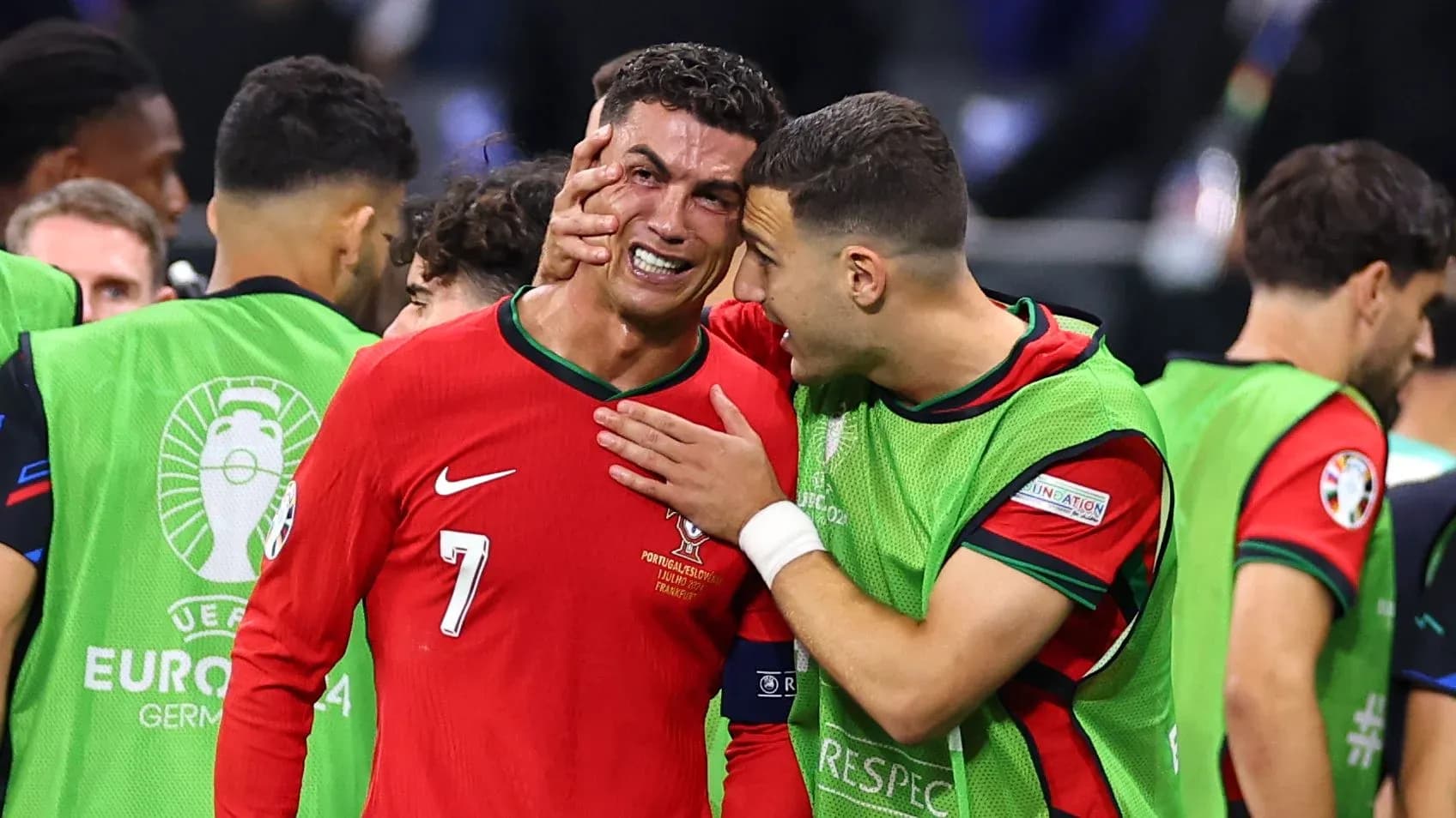 Cristiano Ronaldo with teammate after match
