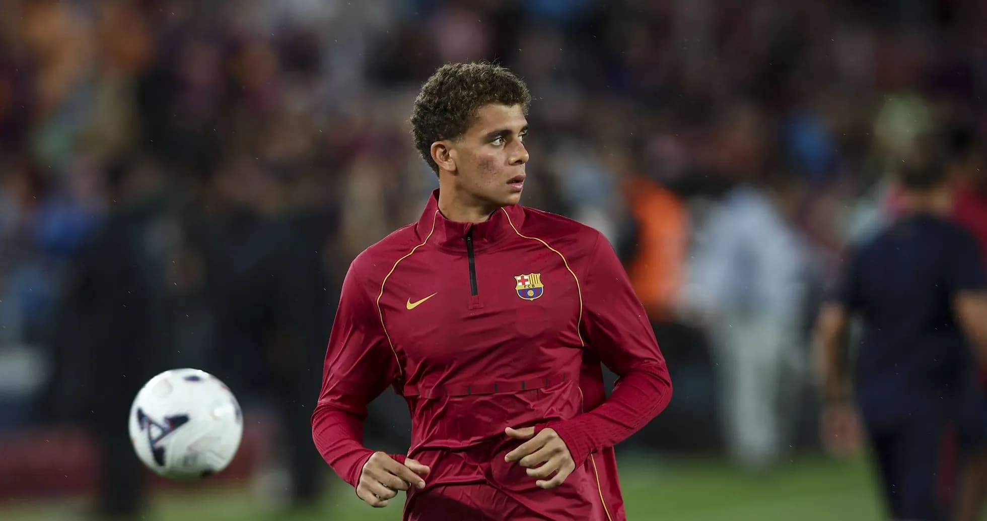 Jugador de FC Barcelona calentando antes del partido