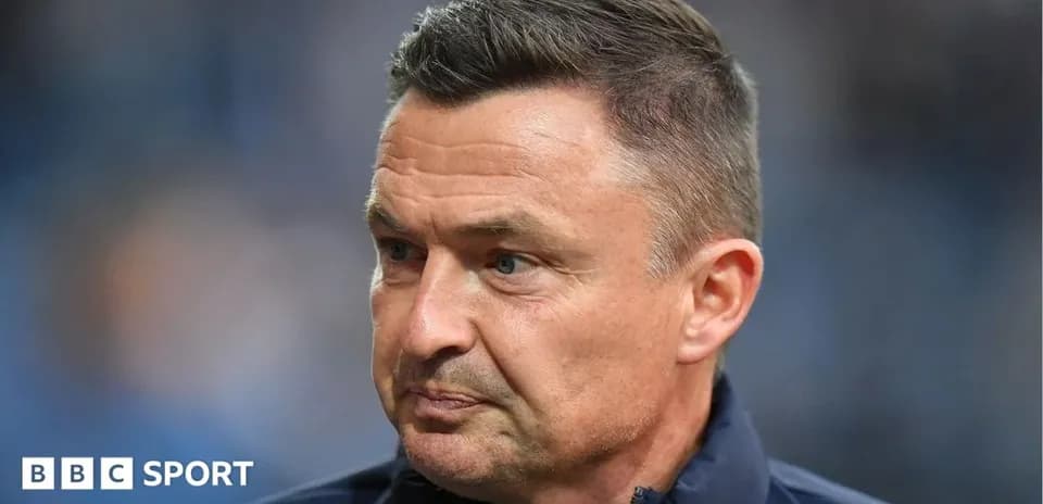 Entrenador en primer plano durante un partido