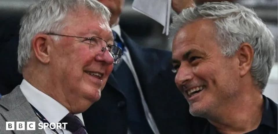 Dos hombres sonriendo en un evento deportivo