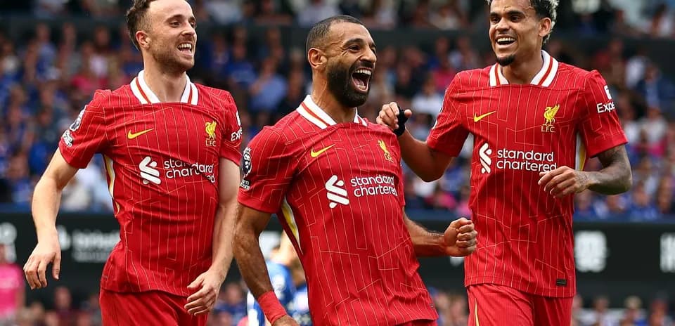 Jugadores de Liverpool celebrando un gol