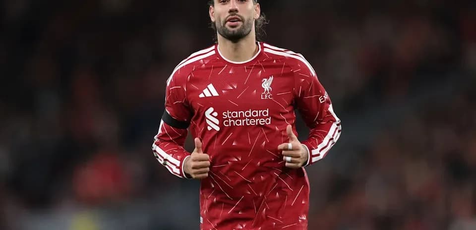 Jugador de Liverpool en calentamiento antes del partido