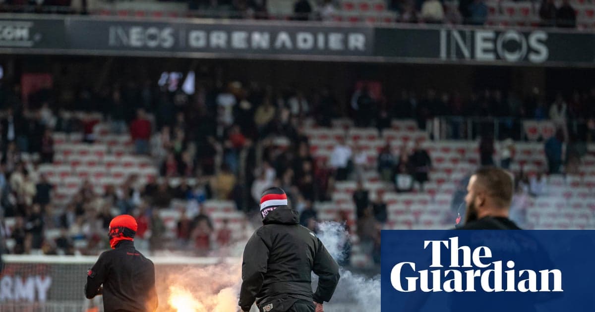 Aflare being lit by fans in stadium