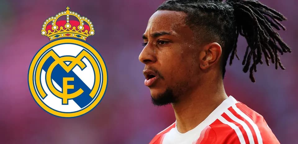 Jugador de fútbol con camiseta roja y logo de Real Madrid