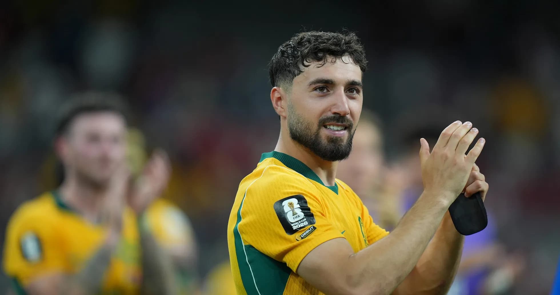 Jugador australiano aplaudiendo tras el partido