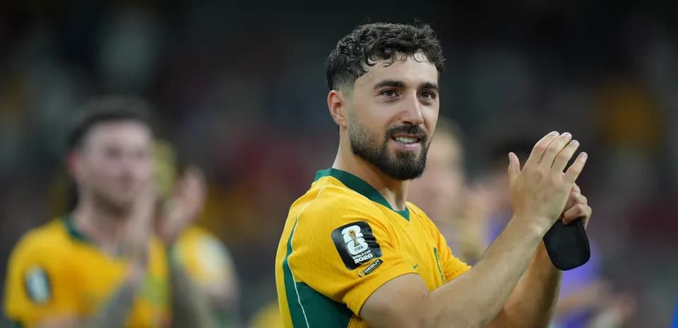 Jugador australiano aplaudiendo tras el partido