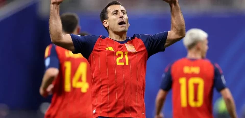 Jugador de España celebrando con los brazos en alto