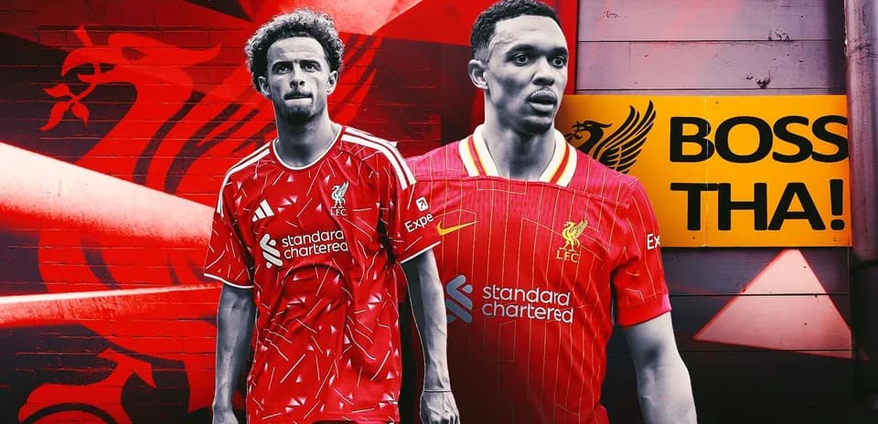 Jugadores de Liverpool posando frente a un mural
