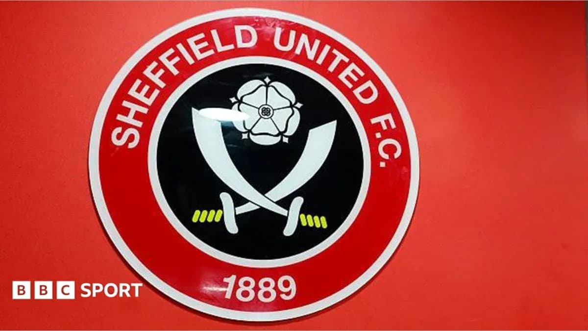 Escudo del Sheffield United F.C. en la pared