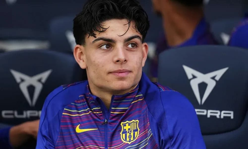 Jugador sentado en el banquillo del FC Barcelona