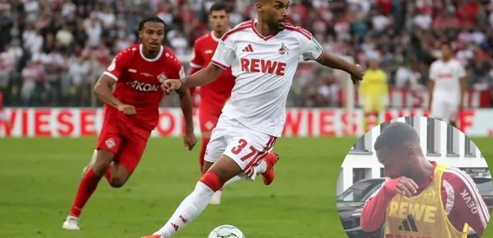 Jugador del FC Köln corriendo con el balón en un partido