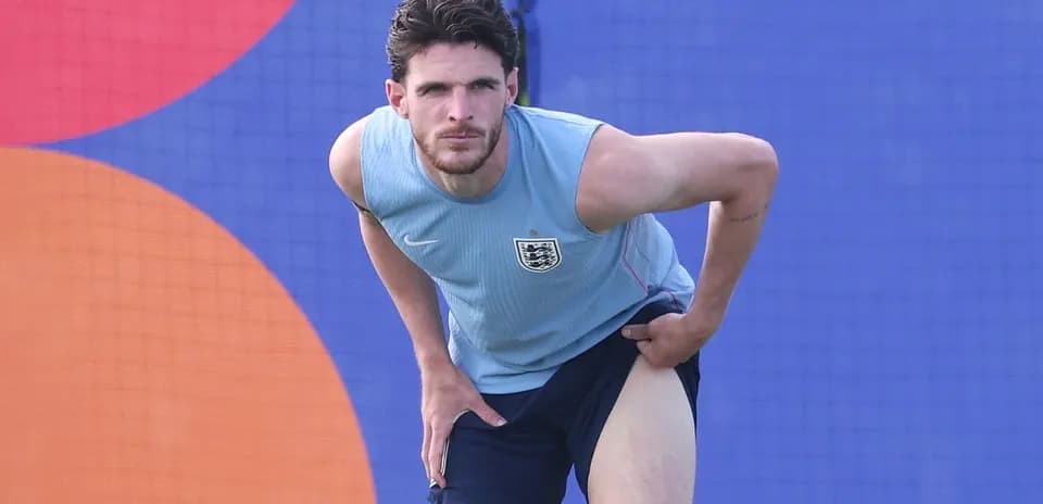 Jugador de Inglaterra estirando en entrenamiento