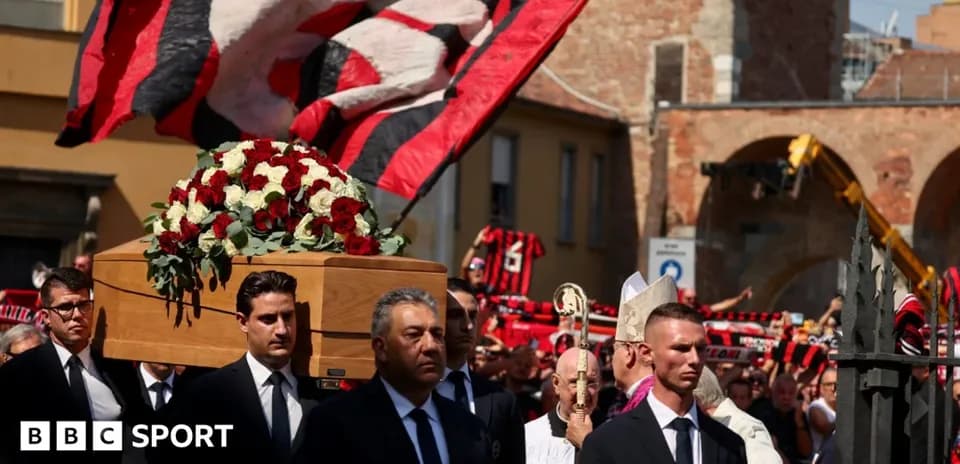 Funeral procession with casket and supporters holding flags