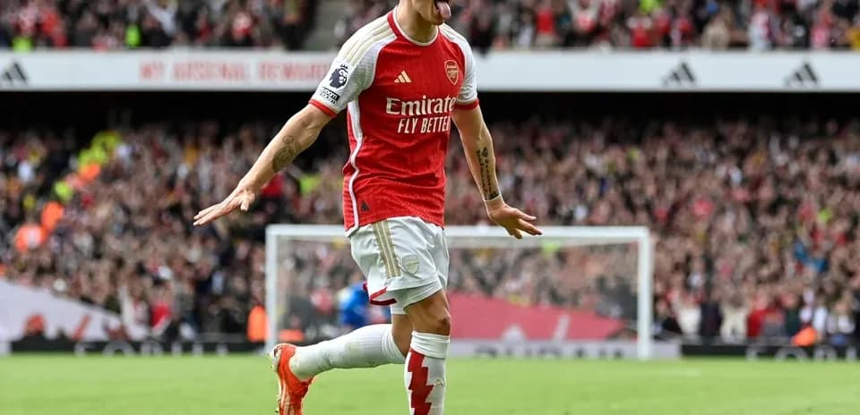 Jugador de Arsenal celebrando un gol en el estadio