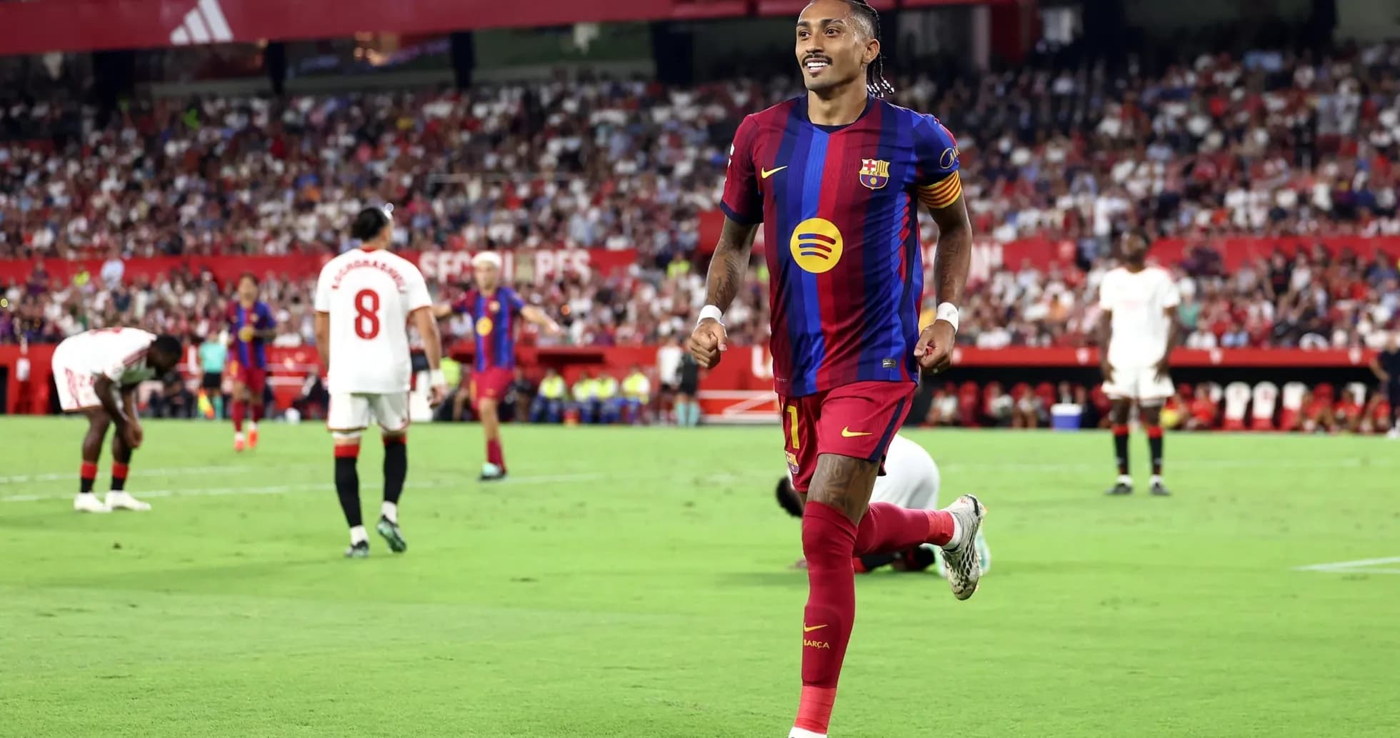 Jugador de Barcelona celebrando un gol en Sevilla Jugador de Barcelona celebrando un gol en Sevilla