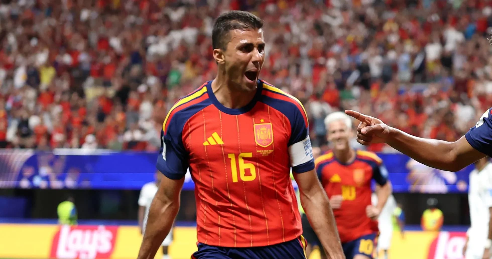 Jugador de España celebrando un gol en el partido Jugador de España celebrando un gol en el partido