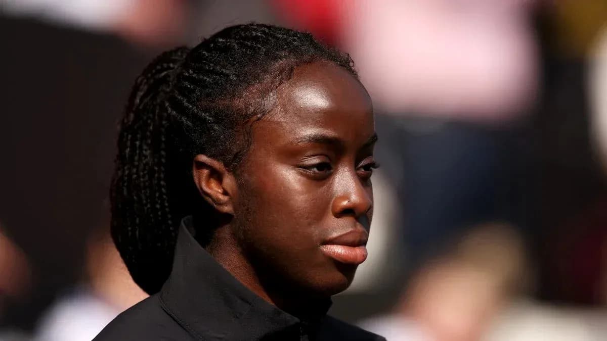 Jugadora en el campo antes de un partido Jugadora en el campo antes de un partido
