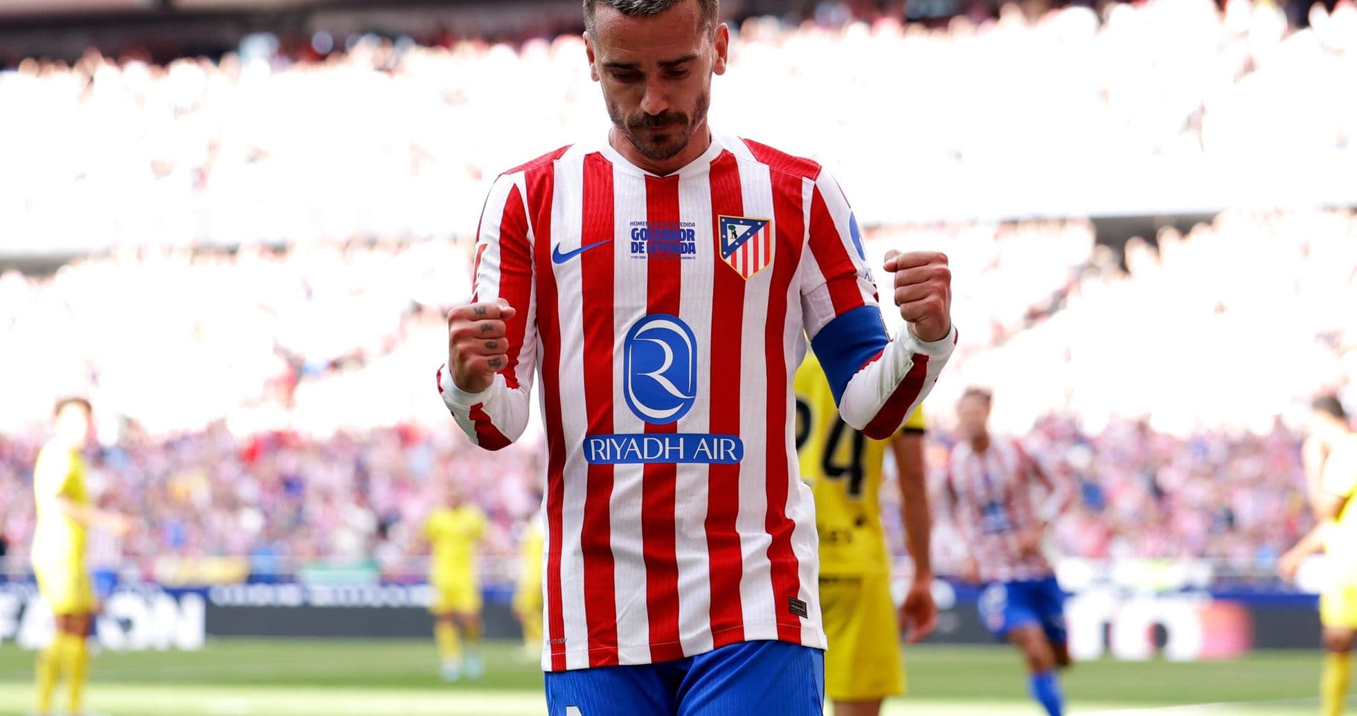 Jugador de Atlético de Madrid celebrando un gol Jugador de Atlético de Madrid celebrando un gol