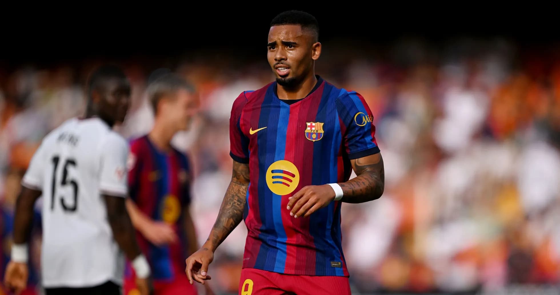 Jugador de Barcelona en acción durante el partido Jugador de Barcelona en acción durante el partido