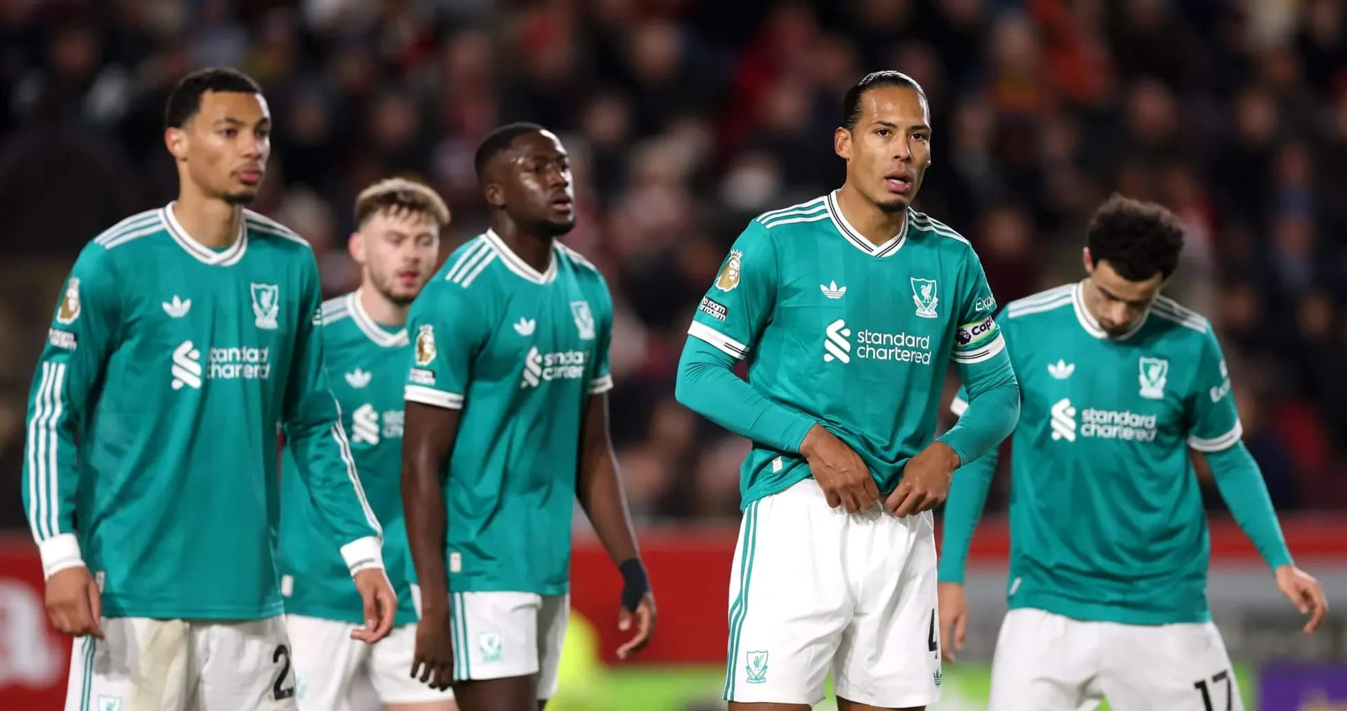 Jugadores de Liverpool durante un partido Jugadores de Liverpool durante un partido