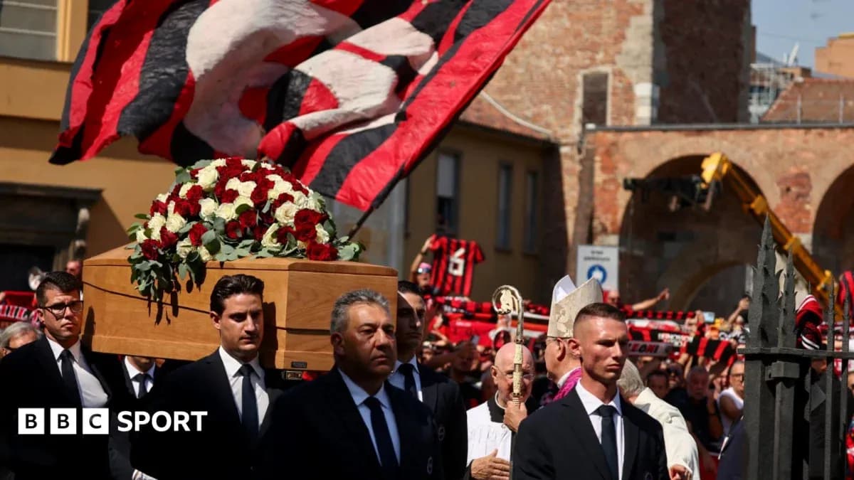 Funeral procession with casket and supporters holding flags Funeral procession with casket and supporters holding flags
