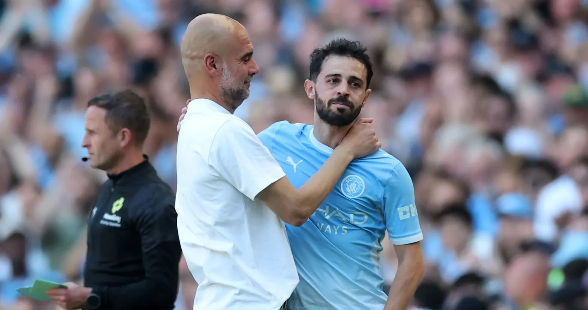 Entrenador y jugador de Manchester City durante el partido Entrenador y jugador de Manchester City durante el partido