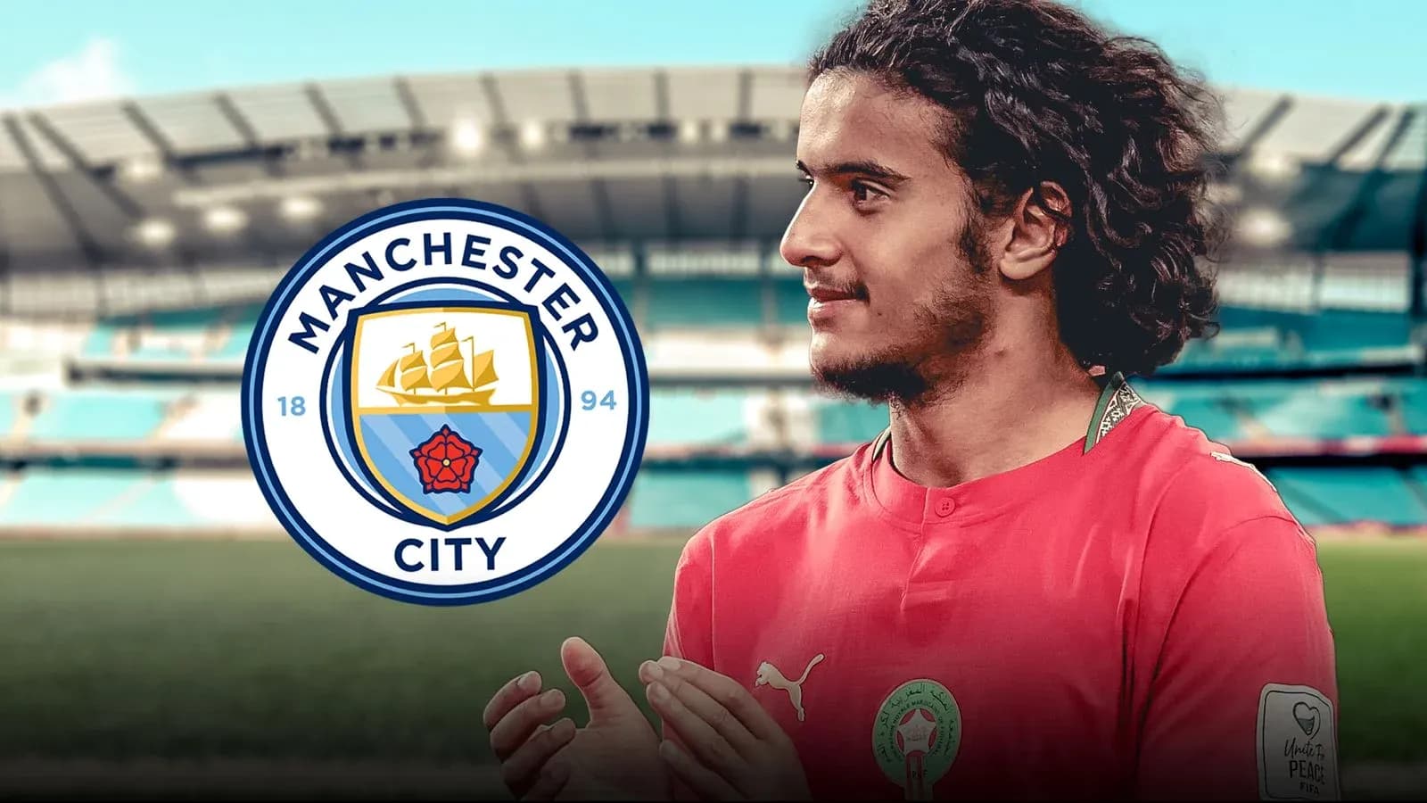 Jugador de Manchester City en estadio con logo Jugador de Manchester City en estadio con logo