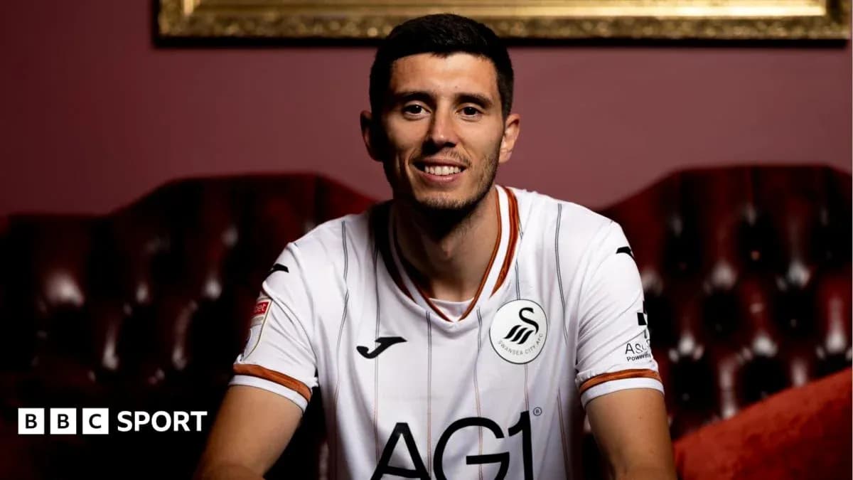 Jugador posando en camiseta de Swansea City Jugador posando en camiseta de Swansea City